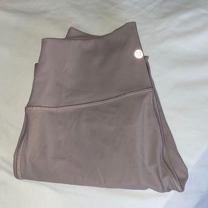 Blush pink color. Bought wrong size. Wunder Under style. Length: 7/8